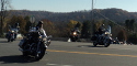 Riders turn from Vales Mill Road on to Hwy. 64.